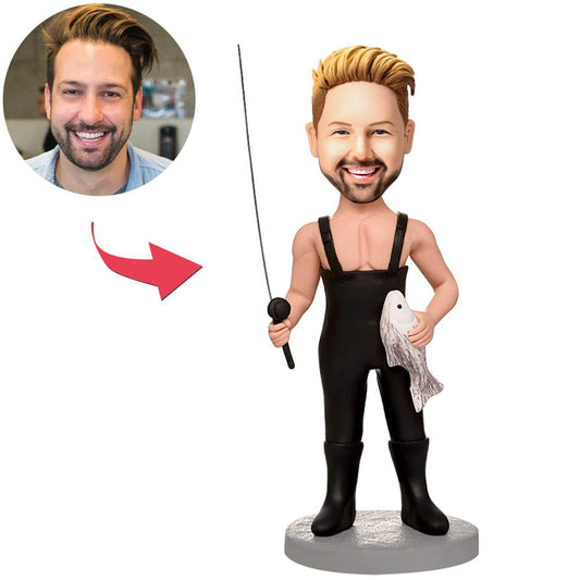 Personalised fishing bobblehead — custom polymer clay fisherman with personalised head and engraved plaque on the base, ideal custom fishing gift