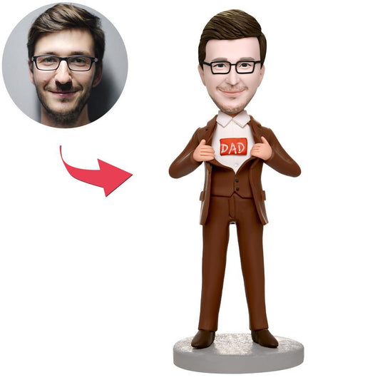 Personalised Super Dad bobblehead in a business brown suit — polymer clay custom head capturing hairstyle and facial features with engraved text on the base, ideal Father’s Day or birthday gift