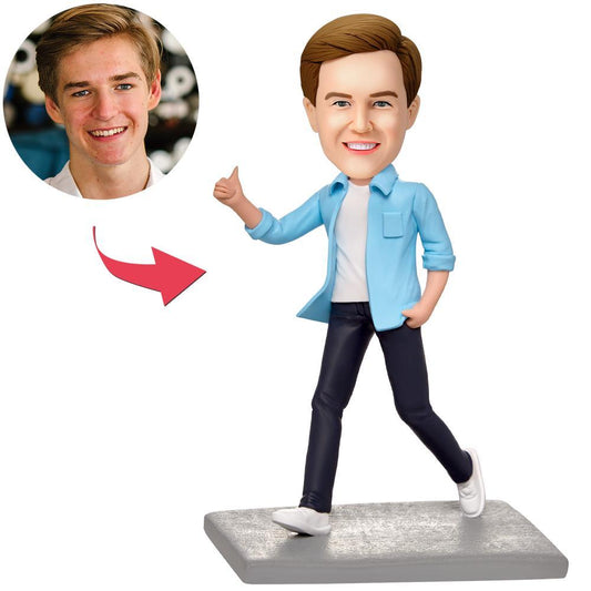 Personalised Happy Walking Man bobblehead in polymer clay – cheerful walking pose with custom engraved text on the base, personalised head made from your photo, ideal engraved gift for UK and Australia