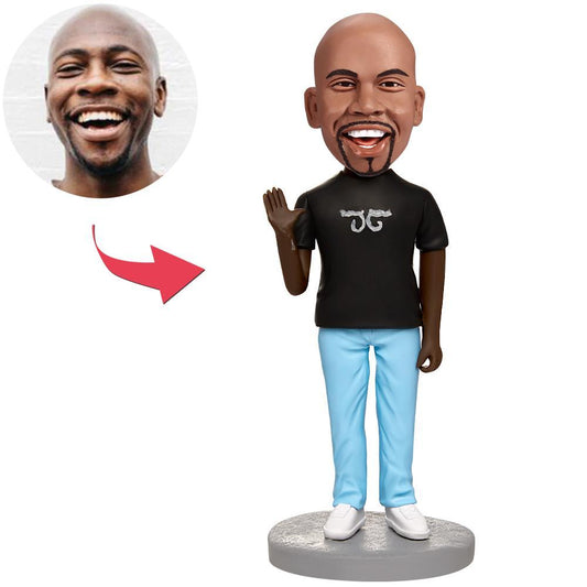 Personalised Black man bobblehead in polymer clay, front view with custom engraved text on the base — hand-crafted personalised gift