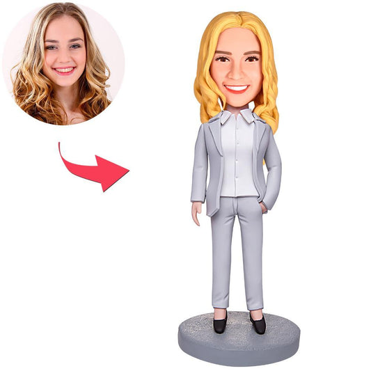 Custom grey suit boss business woman bobblehead with personalised engraved text on base, polymer clay full standing figure with customised head