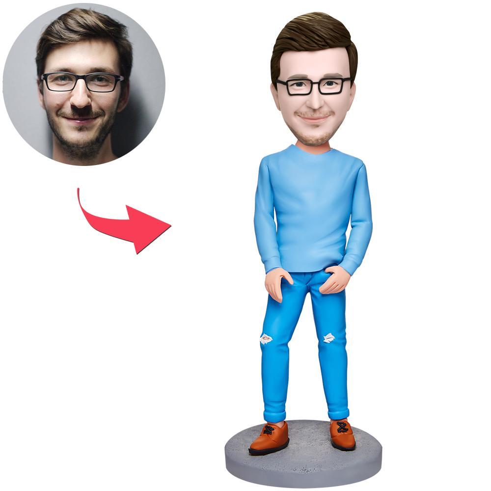 Personalised polymer clay bobblehead of a modern casual man in a blue suit, customisable head created from photos with engraved text on the base