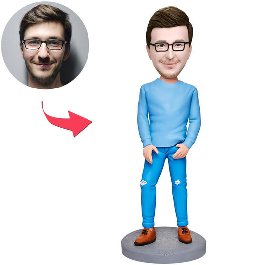 Personalised polymer clay bobblehead of a modern casual man in a blue suit, customisable head created from photos with engraved text on the base