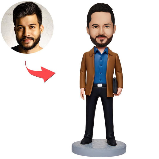 Personalised business man bobblehead in brown outfit with head customised from your photos and optional engraved text on the base — handmade polymer clay corporate gift and office desk ornament for the UK & Australia