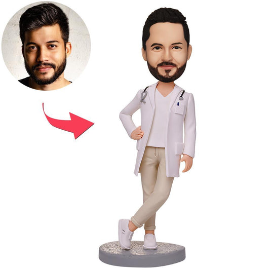 Personalised Doctor with Crossed Feet Bobblehead – handcrafted polymer clay doctor figurine with crossed feet, custom head sculpt from your photo and engraved text on the base, ideal medical graduation or GP desk gift