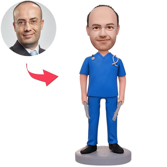 Male doctor custom bobblehead holding medical tools with engraved text on base, polymer clay personalised head, front view