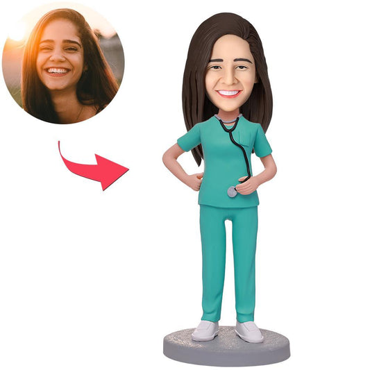 Personalised female doctor bobblehead with stethoscope and engraved base, hand‑sculpted polymer clay figurine ideal as a medical graduation or GP thank‑you gift