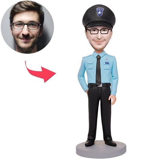 Personalised policeman bobblehead in blue police uniform with engraved text on base — custom face from photo, polymer clay keepsake