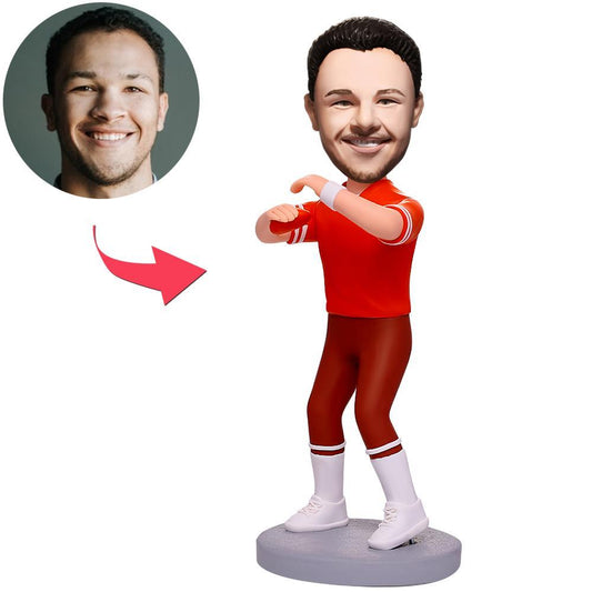 Front view of custom rugby player bobblehead in red sportswear - polymer clay personalised sports figurine with engraved text on the base, ideal rugby gift
