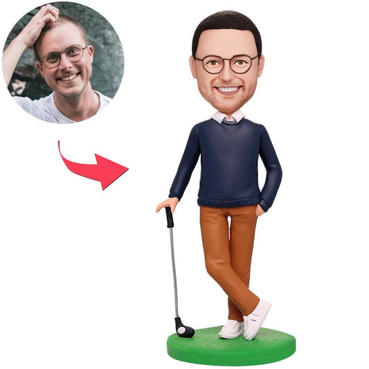 Personalised man playing golf bobblehead in polymer clay — custom head matched to your photos with engraved base text, ideal personalised golf gift