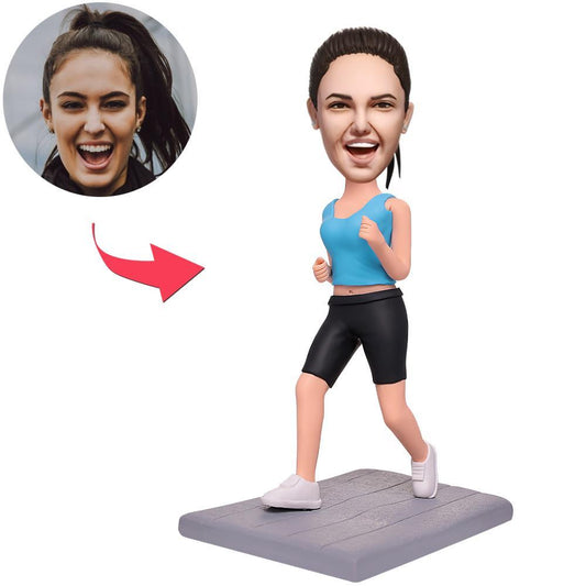 Running woman custom bobblehead with engraved text on base — personalised polymer clay runner gift with customised head and athletic pose