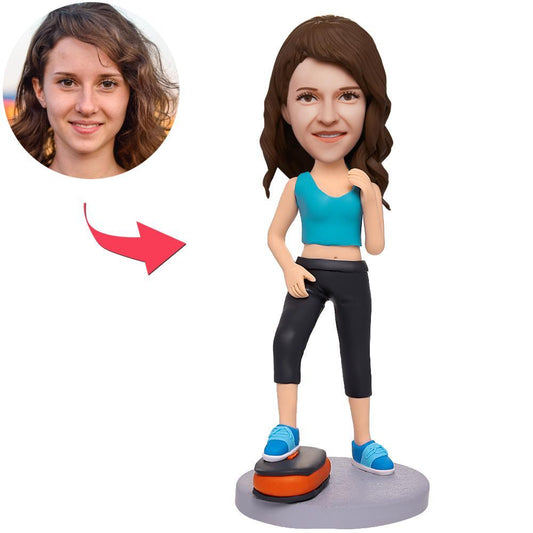 Personalised female fitness instructor bobblehead with engraved text — handcrafted polymer clay figurine with custom head likeness, ideal personalised fitness coach gift