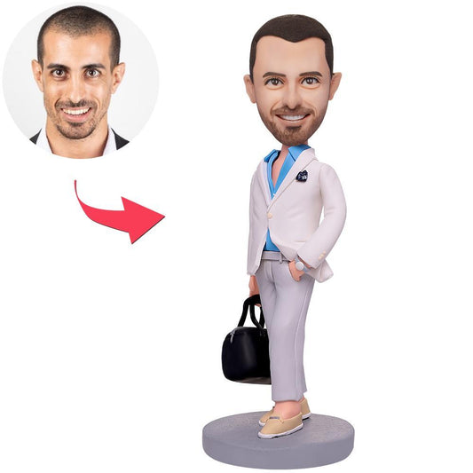 Handmade polymer clay personalised bobblehead – stylish casual man carrying a bag, custom head likeness and optional engraved text