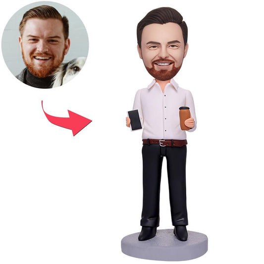 Handcrafted polymer clay custom bobblehead businessman holding coffee and mobile phone, personalised head sculpted from your photo with optional engraved base