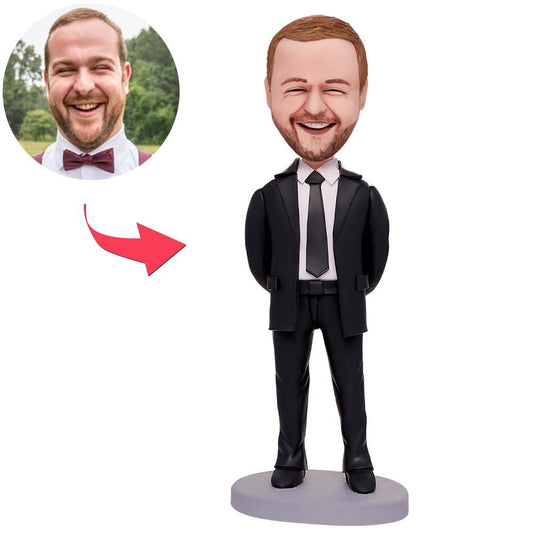 Personalised businessman bobblehead in hands-behind pose, hand‑painted polymer clay figure with engraved base for custom name or date — bespoke corporate desk ornament, ideal gift in the UK and Australia