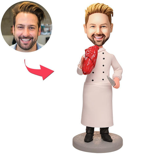Personalised Butcher Bobblehead with Engraved Text – handcrafted polymer clay butcher figure in apron and cleaver, customised head to match supplied photo, engraved name on base; perfect personalised butcher gift or retirement keepsake