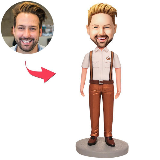 Custom man bobblehead in brown overalls – personalised polymer clay figurine with customised head, front view, ideal gift