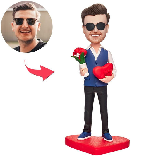 Personalised polymer clay bobblehead of a man holding roses and a heart, custom head and engraved text — romantic keepsake gift