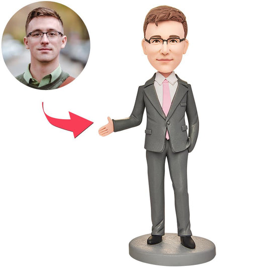 Personalised grey suit businessman bobblehead, handmade polymer clay with customised photo-to-face head and engraved base – ideal corporate or retirement gift