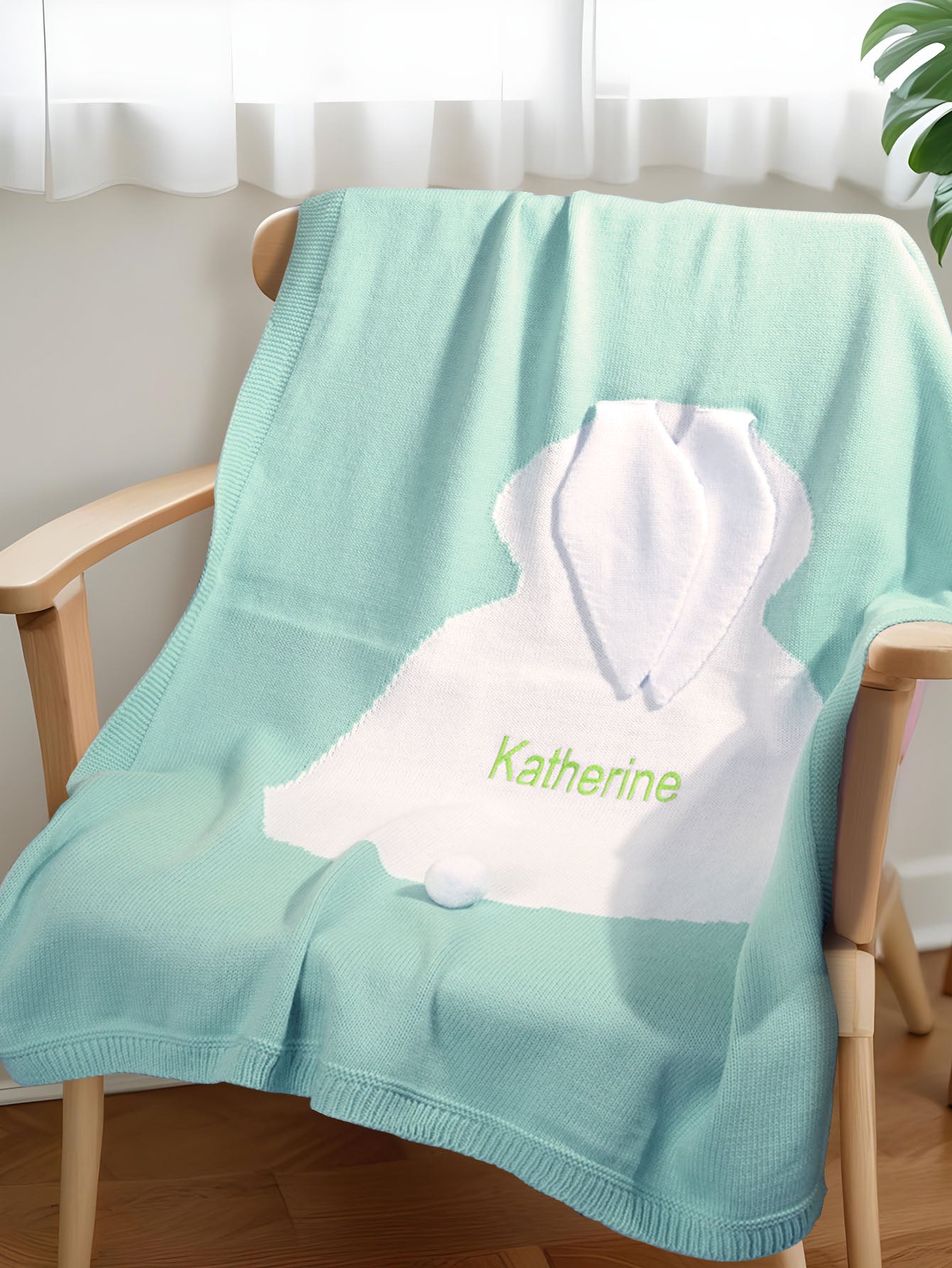Flat lay of the baby blanket demonstrating its full size (78 cm x 108 cm) for nursery use.