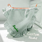 Front view of a square personalised swaddle blanket with embroidered name on neutral backdrop