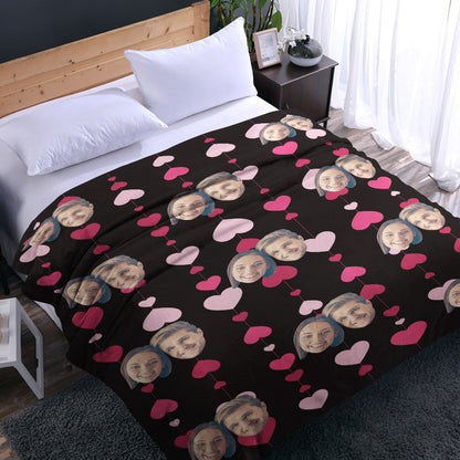 Custom photo blanket displayed on chair with personalised faces and heart motif — soft plush personalised gift for wife or girlfriend