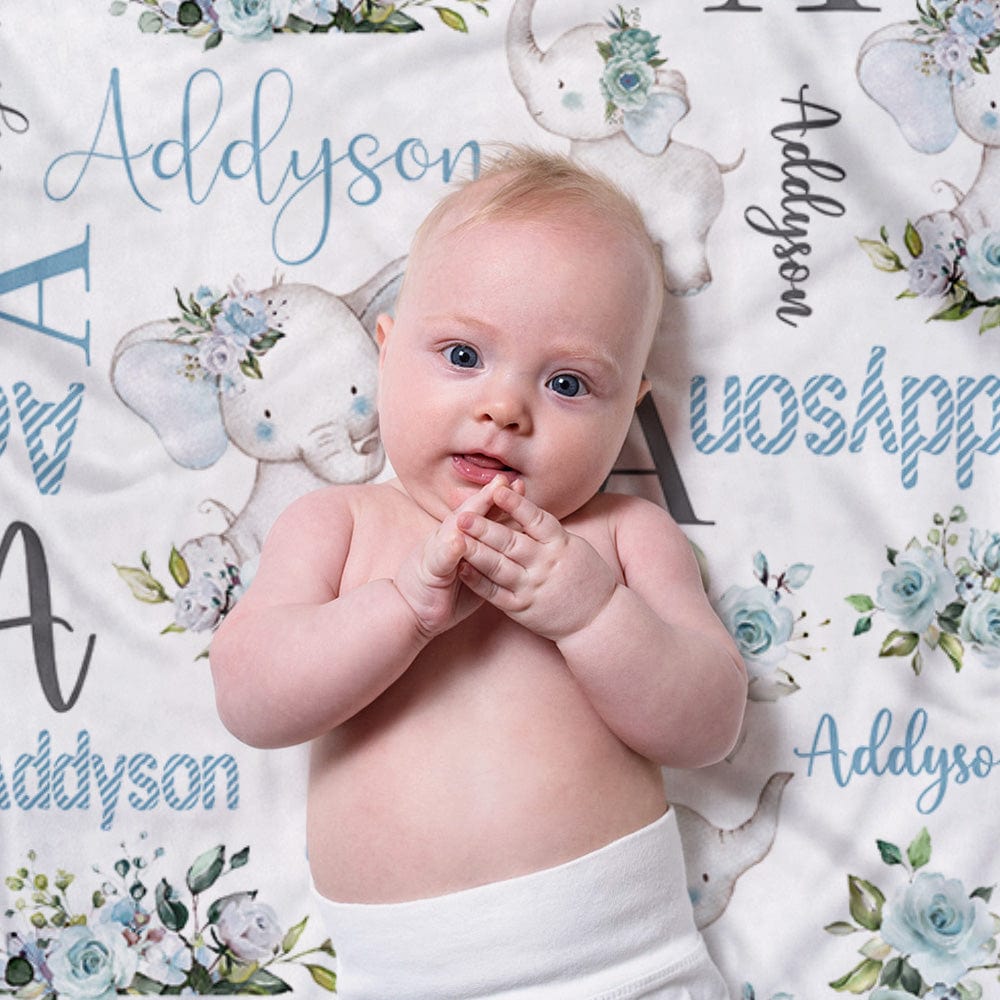 Baby blanket displayed with elephant illustration and personalised name, gift-ready