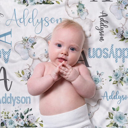 Baby blanket displayed with elephant illustration and personalised name, gift-ready