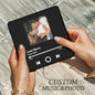 Personalised photo magnet attached to a stainless steel fridge door — elegant black frame with built‑in music movement that plays automatically when the door opens, rechargeable and phone‑free