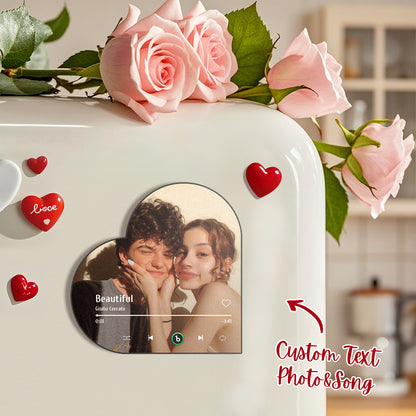 FridgeBeats personalised music fridge magnet in heart-frame album design showing a customised photo and play controls — personalised MP3-playing fridge magnet gift for couples