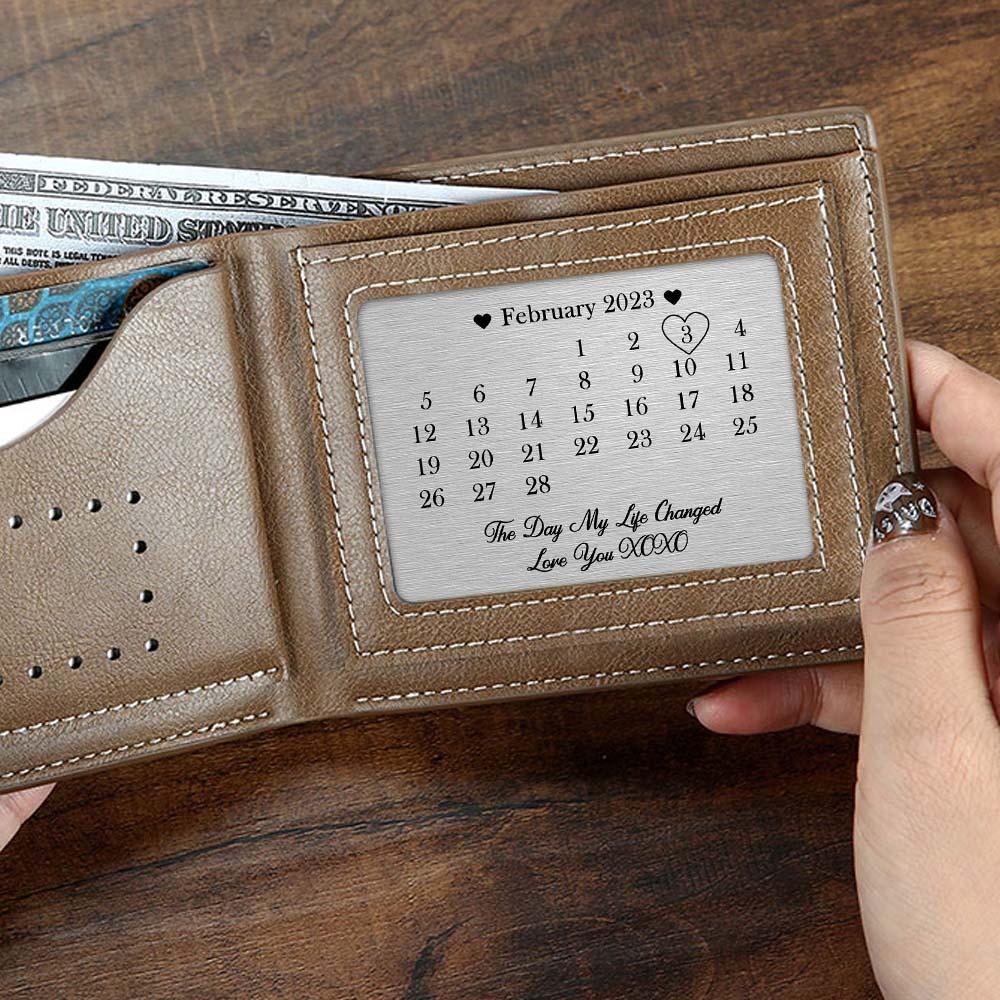 Close-up of personalised metal calendar card engraved with 'Day My Life Changed' date — anniversary or memorial keepsake
