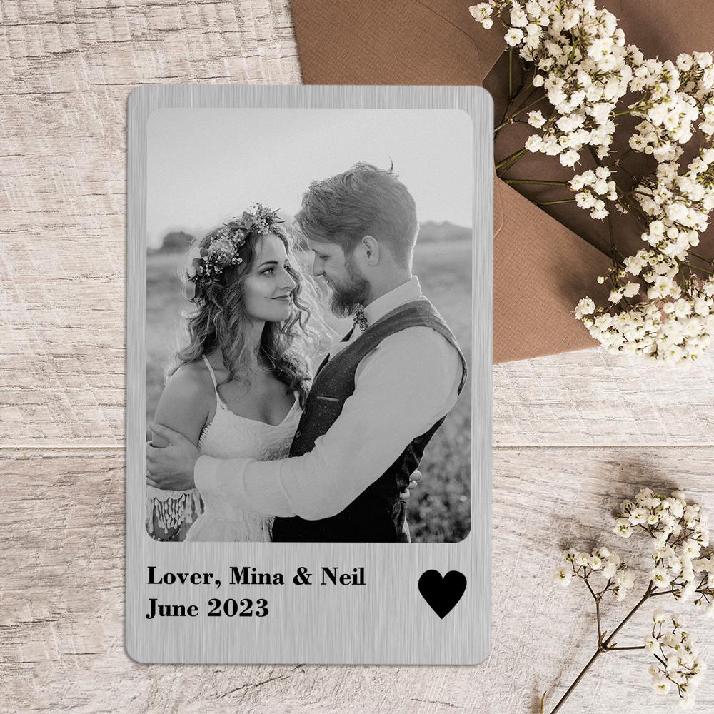 Close-up of personalised metal wallet card showing polished stainless steel finish and rounded safe edges