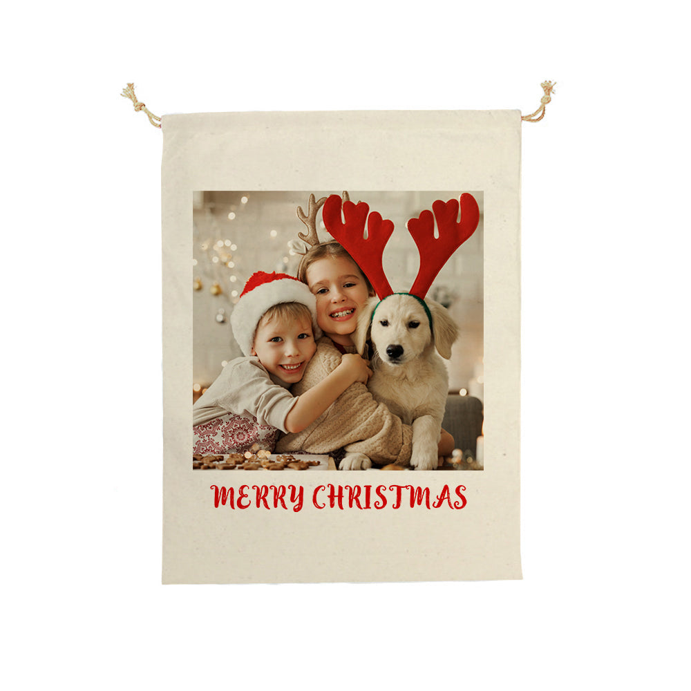 Folded personalised photo Santa sack showing sturdy stitching and roomy interior, reusable large drawstring Christmas gift bag
