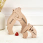 Close-up of laser engraving on personalised wooden bear keepsake showing crisp custom names — engraved wooden family bear puzzle