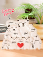 Personalised acrylic bear puzzle photographed against a neutral background to emphasise engraved family names and modern design
