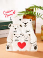 Multiple personalised acrylic bear puzzles displayed together, showing different name layouts and family sizes