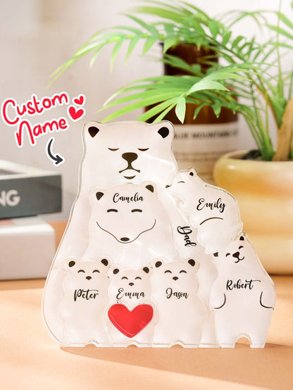 Personalised Bear Family Puzzle placed on a desk with family photos, a meaningful custom acrylic ornament for home décor and personalised gifting