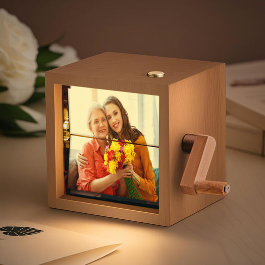 Front view of the Custom Music Photo Flipbook Animation Frame featuring 16 photographs, built-in LEDs and a hand-crank mechanism.