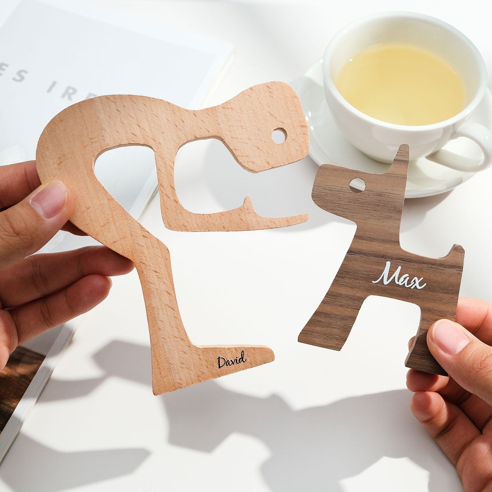 Top-down view of personalised wooden pet carving block showing slim profile (15.3 × 12 × 0.9 cm) — compact customised name ornament