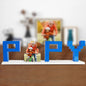 Hand holding a personalised photo brick puzzle — compact 22.4×8.5×4.8 cm display gift