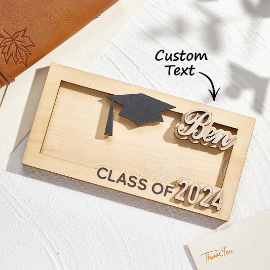 Personalised engraved wooden money box front view — compact 18 x 9 x 2.2 cm graduation keepsake, custom name or date engraving