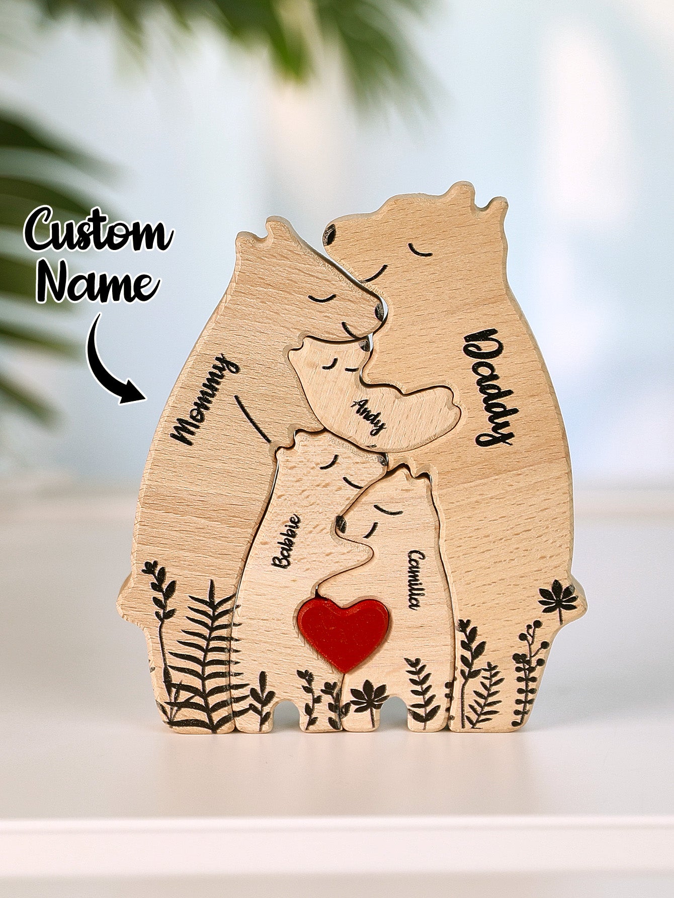 Set of personalised wooden bear puzzle pieces fitted together into a heart shape – bespoke engraved family ornament