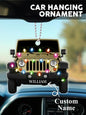 Detailed image of personalised car ornament suspended by ribbon, showing engraved name and crystal-clear acrylic silhouette