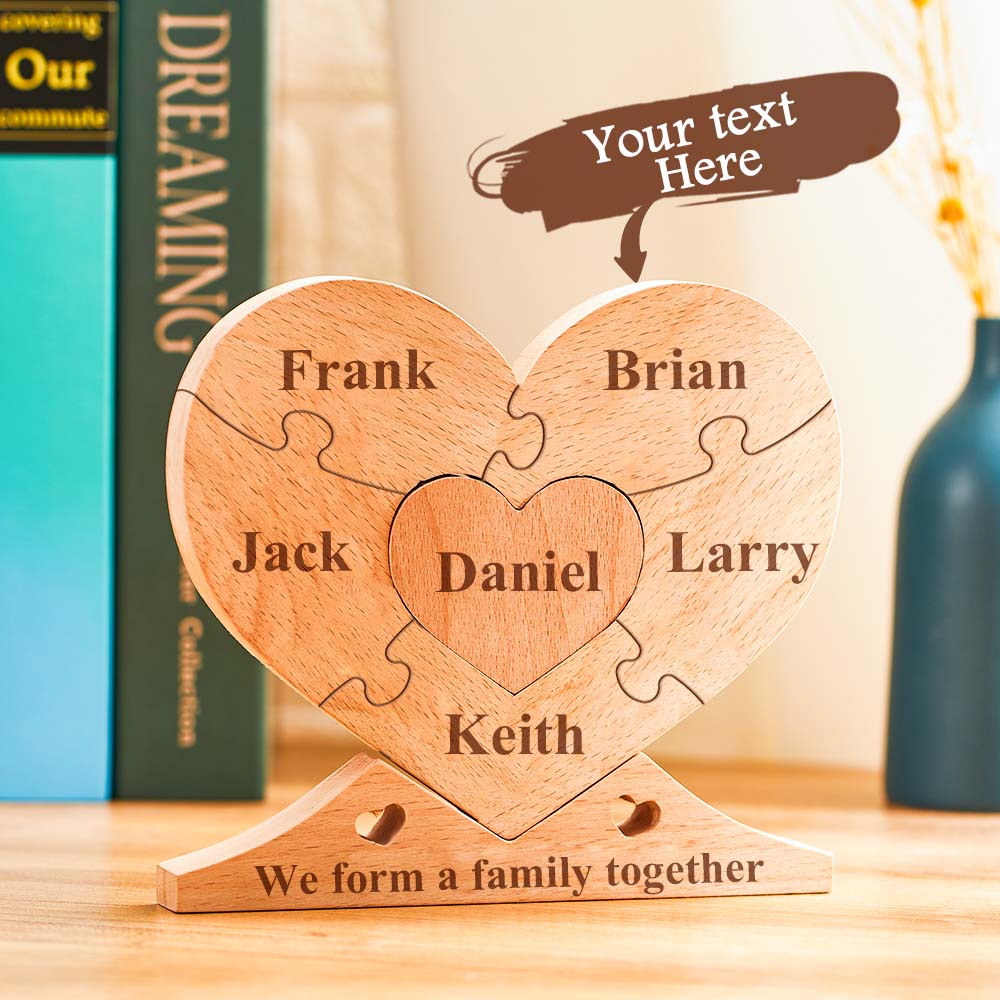 Personalised heart puzzle displayed on a mantelpiece as a wedding or anniversary gift — engraved wooden name ornament for family