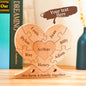 Natural wood finish and smooth edges of the custom engraved heart puzzle — tactile personalised family ornament ready for engraving