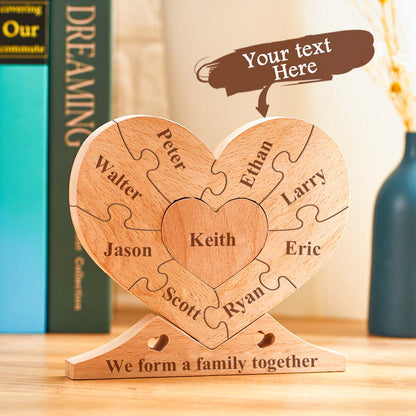 Individual interlocking wooden name pieces from the heart puzzle laid out to show customised engraving for each family member — personalised keepsake