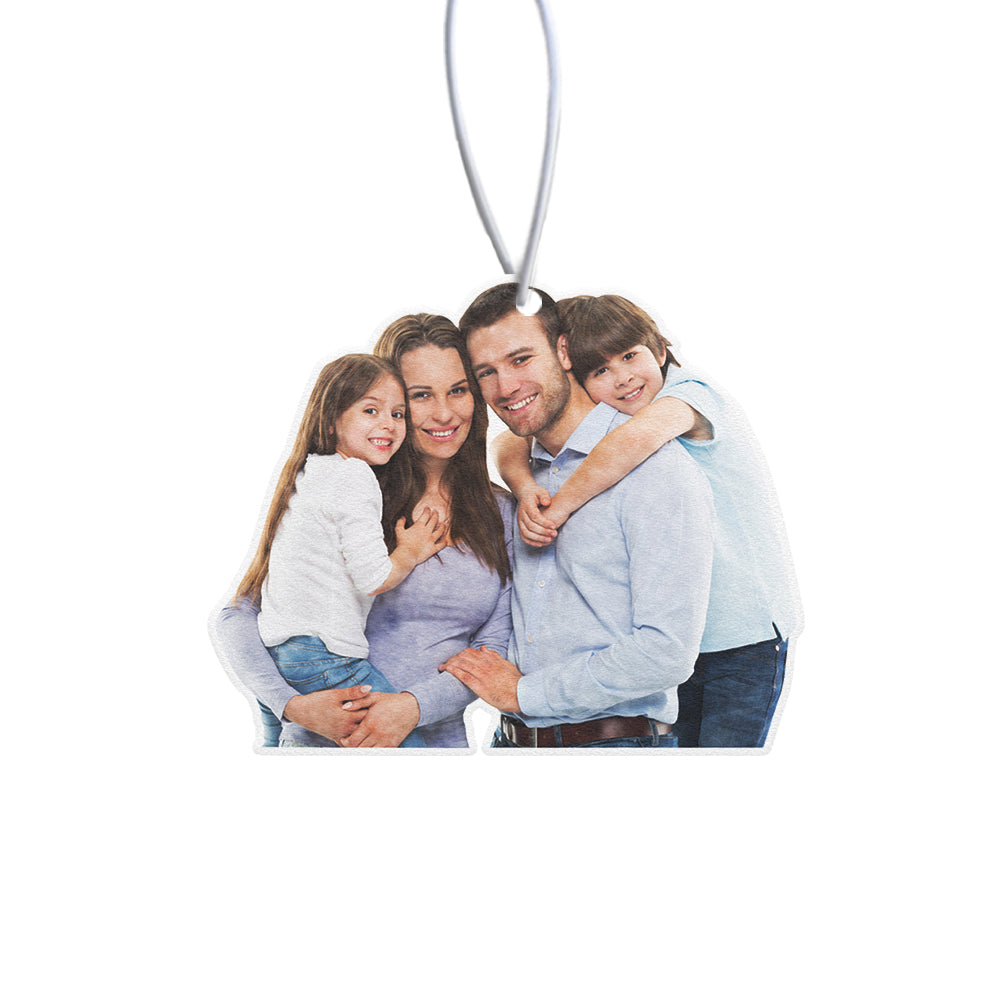 Single ornament with photo print and hanging ribbon, illustrating the customiseable facial feature headprint.