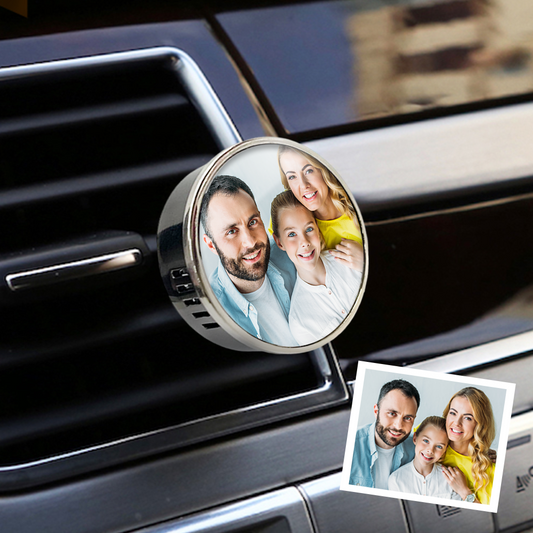 Front view of a personalised car diffuser vent clip on a white background, showcasing a compact magnetic design for fragrance.