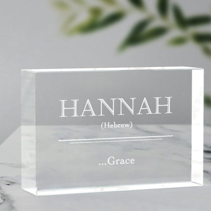 Close-up of engraved crystal glass name-meaning block showing precise internal 3D engraving and LED illuminated base, personalised ornament or engraved photo crystal