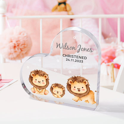 Lifestyle view of engraved acrylic heart ornament displayed in a nursery — personalised name and date keepsake